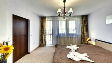 Фото номера Апартаменты с видом на озеро Отель Family Hotel KrisBo г. Donkovtsi 5